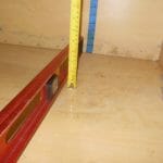 Vertical deflection of shelf (3/16”) and veneer loss (for cabinet filled with 1” of water; none otherwise)